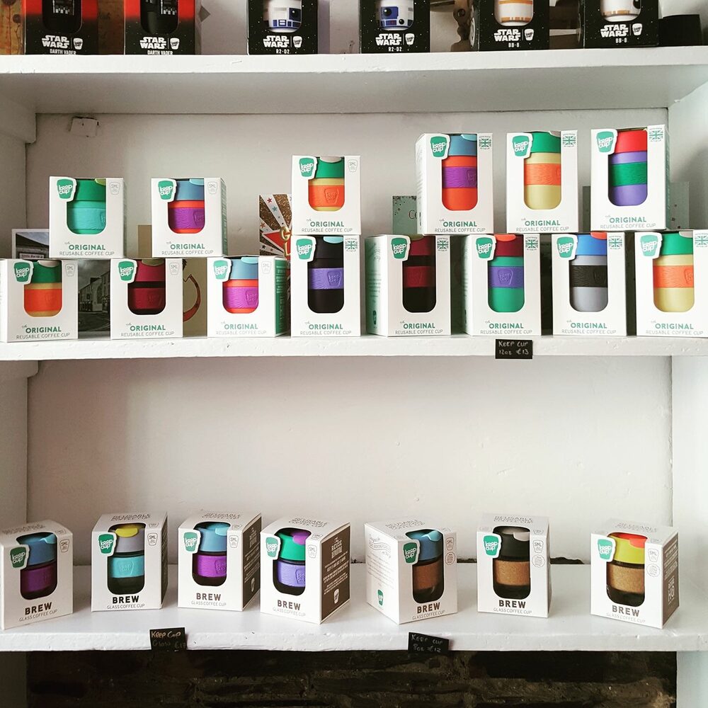 Shelves of boxed Keep Cups in many colours